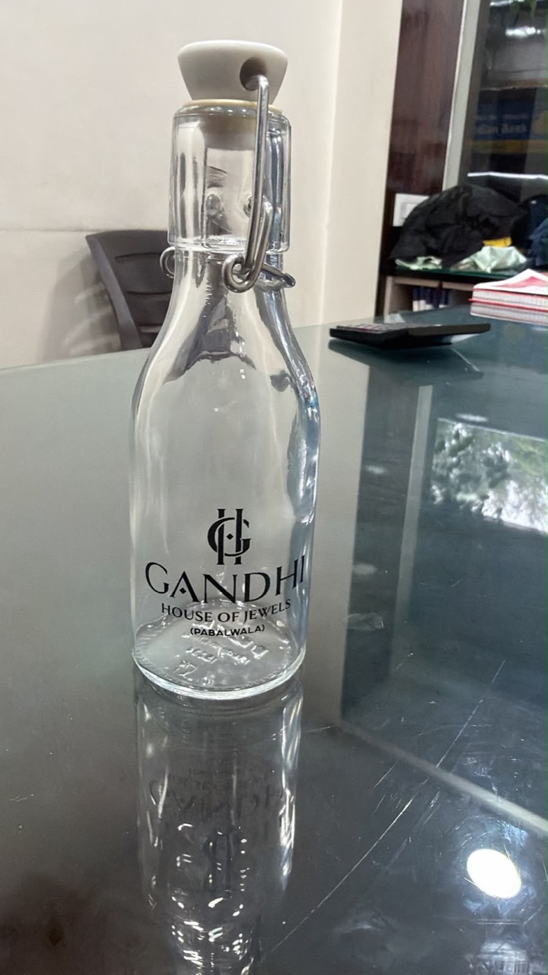 Glass bottle direct-printed for a jewellery house.